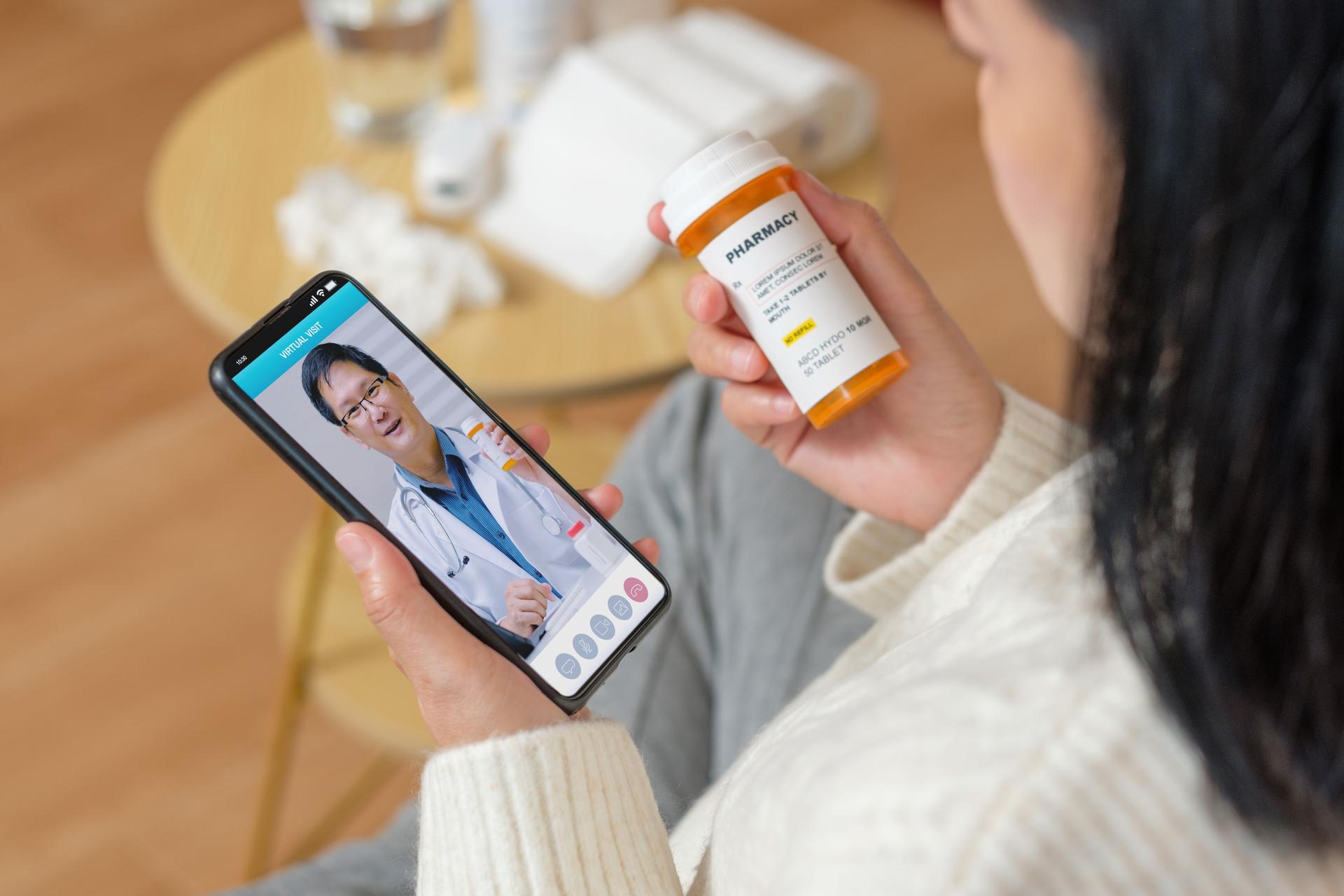 Consulting doctor visit on mobile app at home.telemedicine